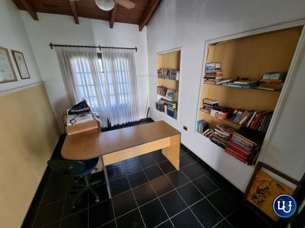 Casa céntrica de dos plantas